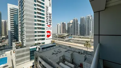 a view of a city skyline with tall buildings at Dubai Marina - 1 BHK Classy Apartment in Dubai