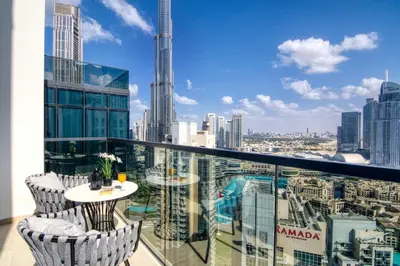 a balcony with a view of the city at Luxurious 2BDR Apartment with Burj Khalifa Views in Dubai