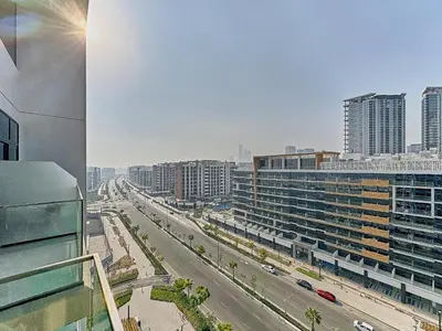 a view of a city with buildings and a highway at Bright Studio in Azizi Riviera Perfect Getaway in Dubai