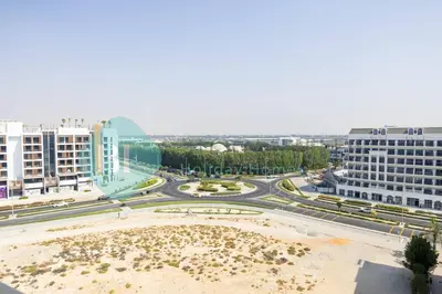 a view of a city with a road and buildings at Bloomfields Elegant Stu Jewelz in Dubai