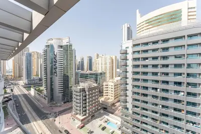 an aerial view of a city with tall buildings at Central 1BR in Marina with Private Terrace & Pool in Dubai