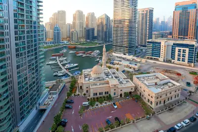 an aerial view of a city with tall buildings at Superb 1Bed Marina View pool JBR Beach Parking in Dubai