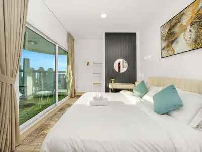 a bedroom with a large bed and a large window at Stunning Panoramic Sea & Marina Skyline View in Dubai