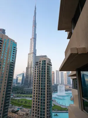 a view of a city skyline with a tall building at New Burj Khalifa & Fountain Views & Work station in Dubai