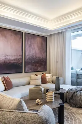 a living room with a couch and a table at The Smart Concierge - Grandeur Residence - Maurya in Dubai