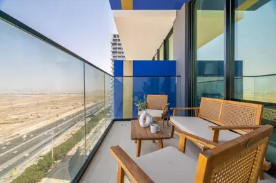 an apartment balcony with views of an airport at GuestReady - Glamorous stay at Binghatti Corner in Dubai
