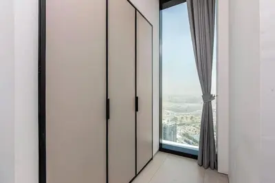 an open door with a view of a city at Famous Address JBR HIGH FLOOR Sea View in Dubai