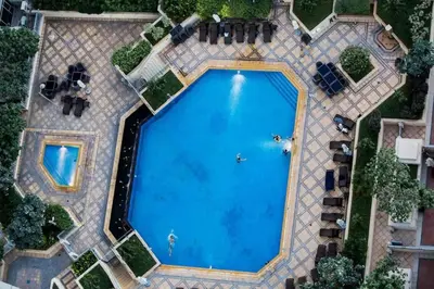 an overhead view of a large swimming pool at Downtown Gem, Fountain View! in Dubai