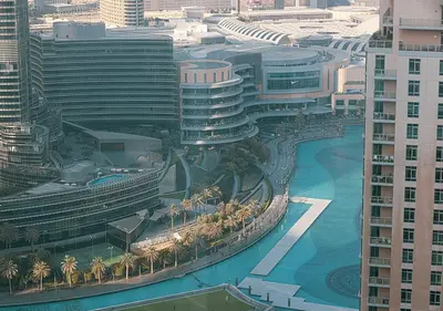an aerial view of a city with tall buildings at Luxury Apartment with Full Burj Khalifa and Downtown Views in Dubai