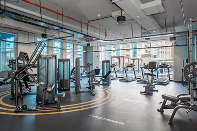 a gym with treadmills and cardio equipment in a building at Studio in Studio One Marina in Dubai