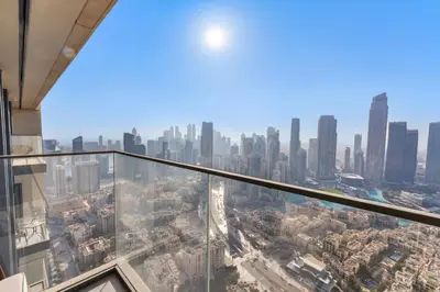 a view of the city from the top of a skyscraper at Full Fountain and Burj View - 3BR Burj Royale in Dubai