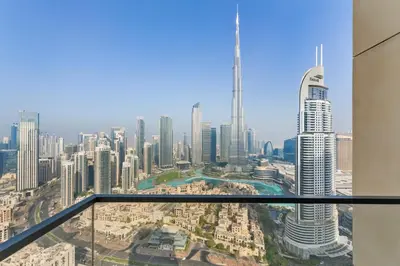 a view of a city from the top of a skyscraper at Full Fountain and Burj View - 3BR Burj Royale in Dubai