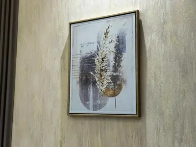 a painting of a plant on a wall at Pathfinder Partition Room in Barsha Heights Tecom in Dubai