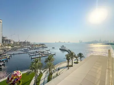 a view of a marina with boats in the water at FIRST CLASS Luxury 2BR in Creek Harbour Pool, Gym, Walk to Dining in Dubai