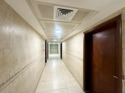 an empty corridor with a door and a corridorngthngthngthngthngthngthngth at Wanderlust Partiton Room in Tecom Near Internet City Metro in Dubai
