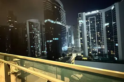 a view of a city skyline at night at Home away from home in Dubai