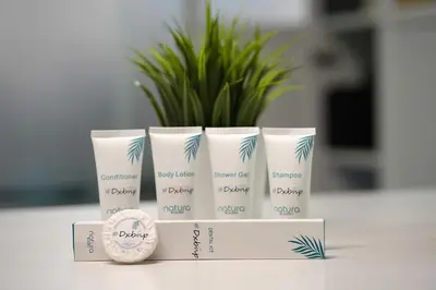 a group of four products sitting on a table at Cove Partition Room in Tecom Near Internet City Metro in Dubai