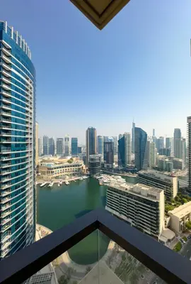 a view of the city from a building at Naseem - Elegant Coastal Retreat with Stunning Marina Views in Dubai