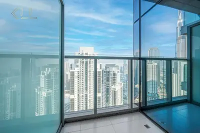 a view of a city skyline from an office building at Luxury 2-Bed in Paramount Midtown Hotel Full Burj Khalifa Views 64th Floor Pool & Burj Views in Dubai