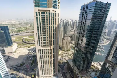 an aerial view of a city with tall buildings at Stunning Interior in an deal Location in Dubai
