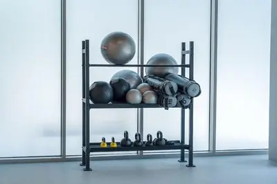 a shelf with balls and other items on it at Casa Nomad - Full Burj Khalifa & Fountain View at Luxury 4 Bed in Dubai