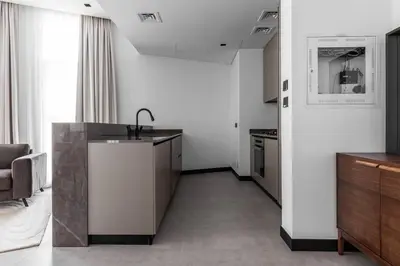 a kitchen with a sink and a counter top at Rare Luxury 1bdr 15 Northside in Dubai