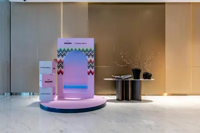a display in a room with a pink stand in a building at Old Form in Dubai
