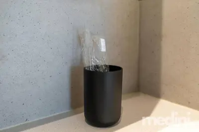 a black vase sitting on top of a counter at 1-Bedroom - in Emaar Creek Harboor in Dubai