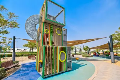 a roller coaster in a park at Modern 1BR in District One Meydan in Dubai