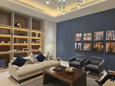 a living room with a couch and two chairs at Fully Furnished 2 Bed in Sobha Creek Vista Reserve, Hosted by Desert City Stays in Dubai