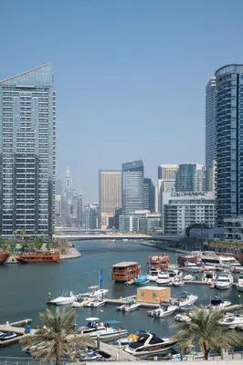 a group of boats in a harbor in a city at Frank Porter - DEC Tower 3 in Dubai