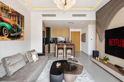 a living room with a couch and a table at Spacious Apartment - Dubai Creek Harbour by DuStay in Dubai