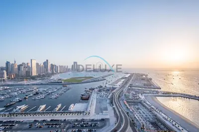 an aerial view of a harbor with a city at Classy 3BR with Assistant Room at Sunrise Bay Tower 1 Emaar Beachfront, Dubai Marina by Deluxe Holiday Homes in Dubai
