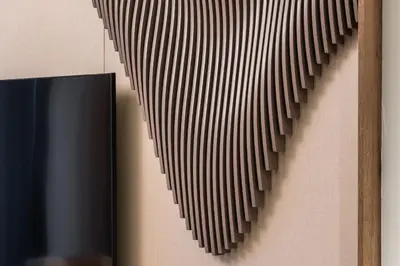 a wall with a heart shaped object on it at Stylish Poolside Apartment in Dubai Creek Harbour - By DuStay in Dubai