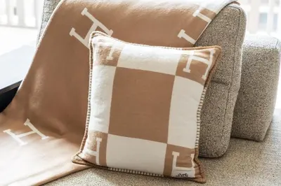 a couple of pillows sitting on a couch at Luxury Getaway Apartment at Dubai Creek Harbour - By Dustay in Dubai