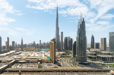 a view of a large city with tall buildings at Peaceful Dunes 1 - Burj Khalifa & Dubai Mall in Dubai