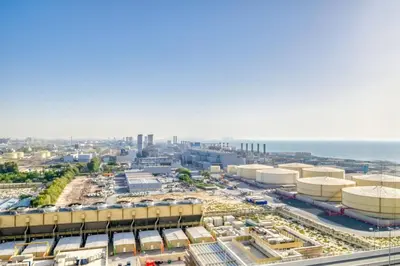 an aerial view of a construction site with the ocean at 5 Mins to JBR Beach, Luxury Studio in Dubai Marina's Best Tower in Dubai