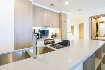 a kitchen with a white counter top in a room at Stella Maris, Dubai Marina- Luxurious 1-BR in Dubai