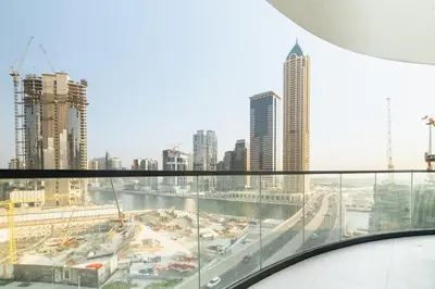 a view of a city from the top of a building at Citihome - 1BR with Huge Balcony & Easy Transport Access in Dubai