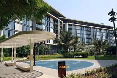 a basketball court in front of a building at Luxurious 2 Bed in Bluewaters, Hosted by Desert City Stays in Dubai