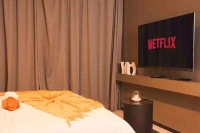 a hotel room with a bed and a television at kinda Holiday Homes- Mag 318 Downtown in Dubai