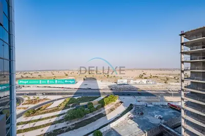 a view of a desert with a building and a street at Charming 1BR in Orchid Residence, Al Barsha South by Deluxe Holiday Homes in Dubai