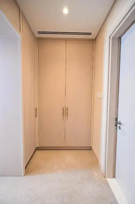 an empty room with closet doors in a house at Luxury 1-BR with Stunning Views in Palm Tower by Luxe Shortlet in Dubai