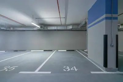 an empty parking lot in a parking garage at GLOBALSTAY Azizi Riviera 45 in Dubai