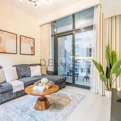 Relaxing 1BR Apartment with Built-in Wardrobe & Community View in Azizi Riviera 4