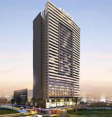 a large tall building with a lot of windows at Exquisite 1Bedroom With City Views in Dubai