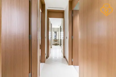 a hallway with wooden walls and a hallway with a heart sign at Keysplease Address Opera 2BR Downtown 26 in Dubai