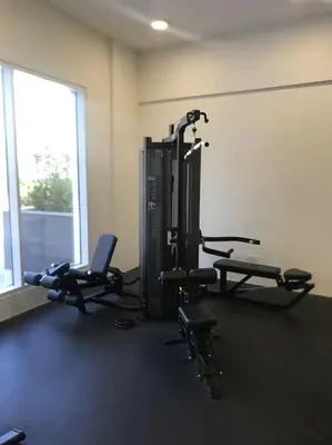 a gym with two tread machines in a room at Cozy studio in Business Bay Dubai in Dubai