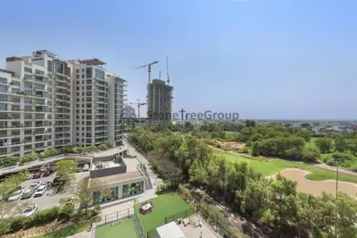 an aerial view of a city with tall buildings at Stylish 1 Br In Unique Location in Dubai