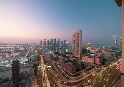 a view of a city with buildings and traffic at Coastal Marina Escape - 4 BR Sea, Dubai Eye & Palm View in Dubai